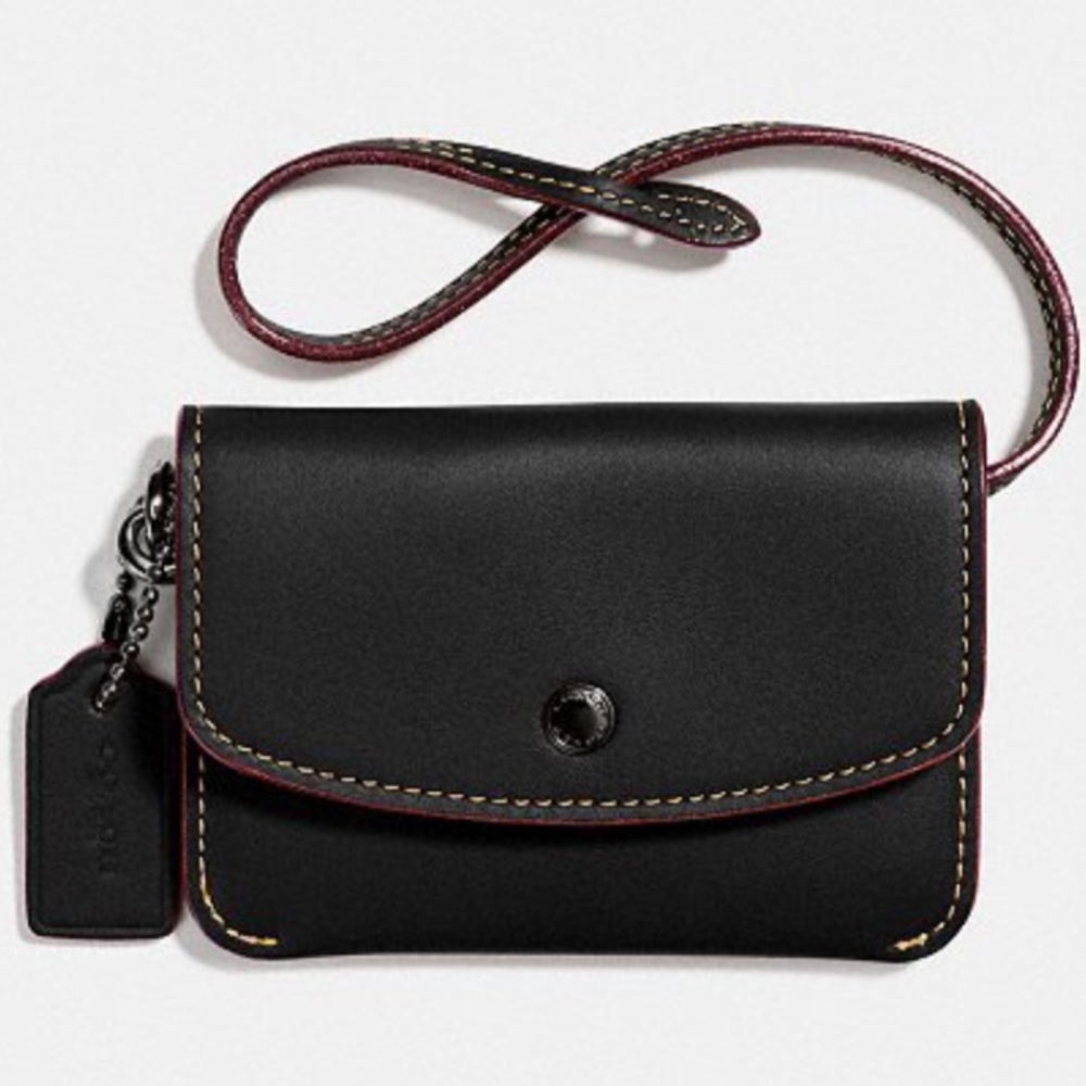Coach glitter metallic interior wristlet wallet
